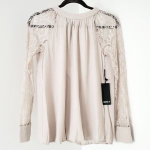 Laced sleeved top